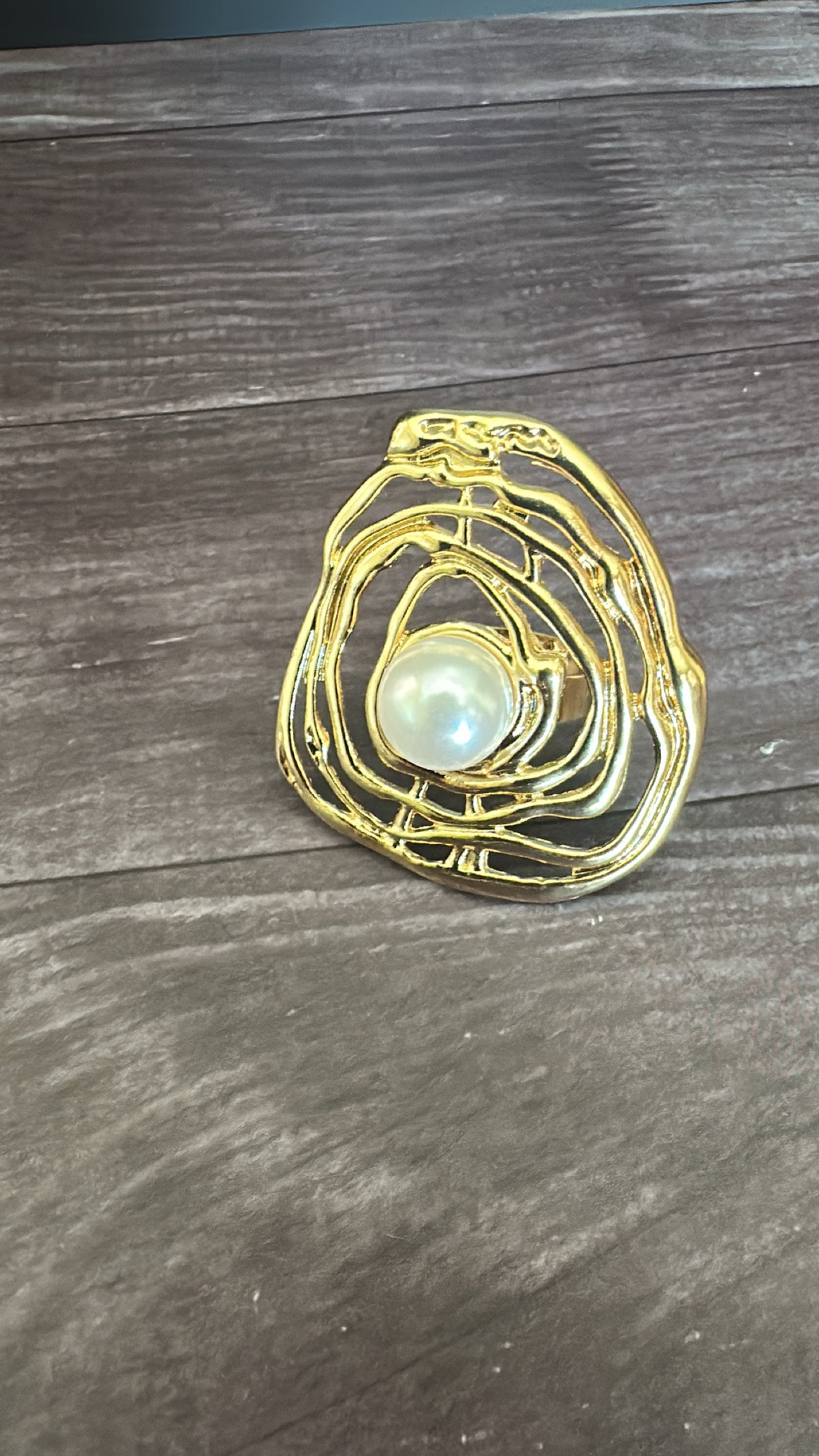 Adjustable center pearl ring